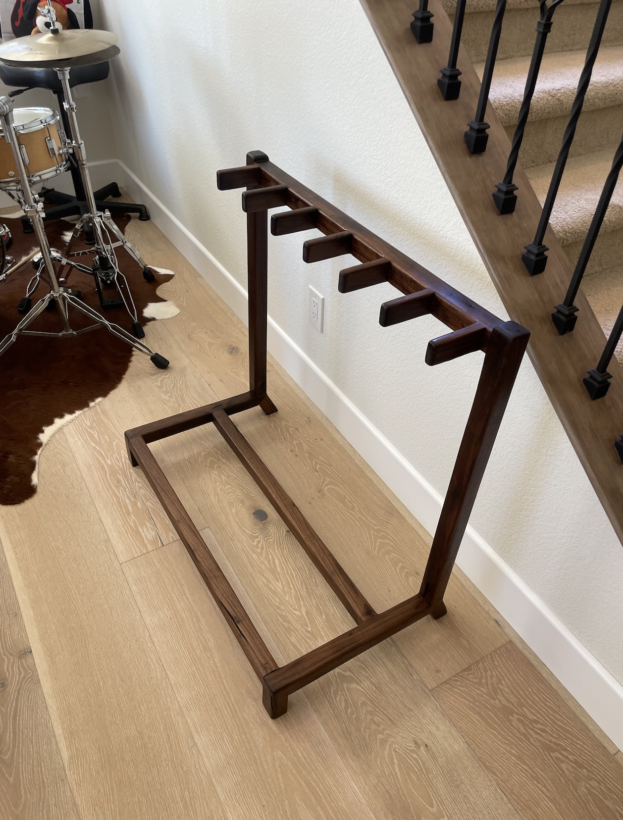 Handmade walnut six-guitar stand